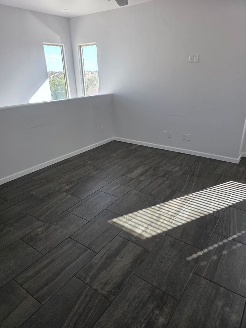 Empty living room before home staging in Las Cruces